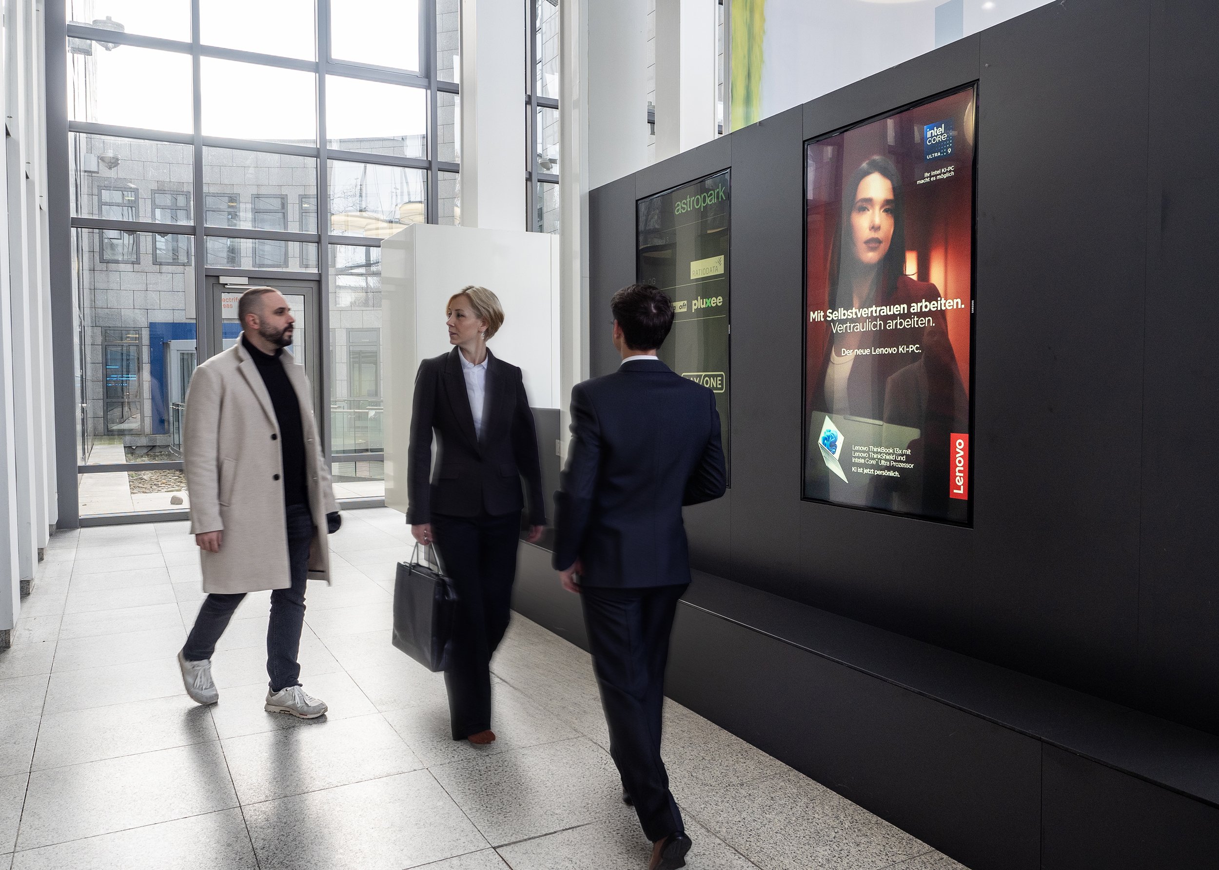 Lenovo KI-PC campaign on ECN screen · AstroPark Frankfurt · premium office DOOH